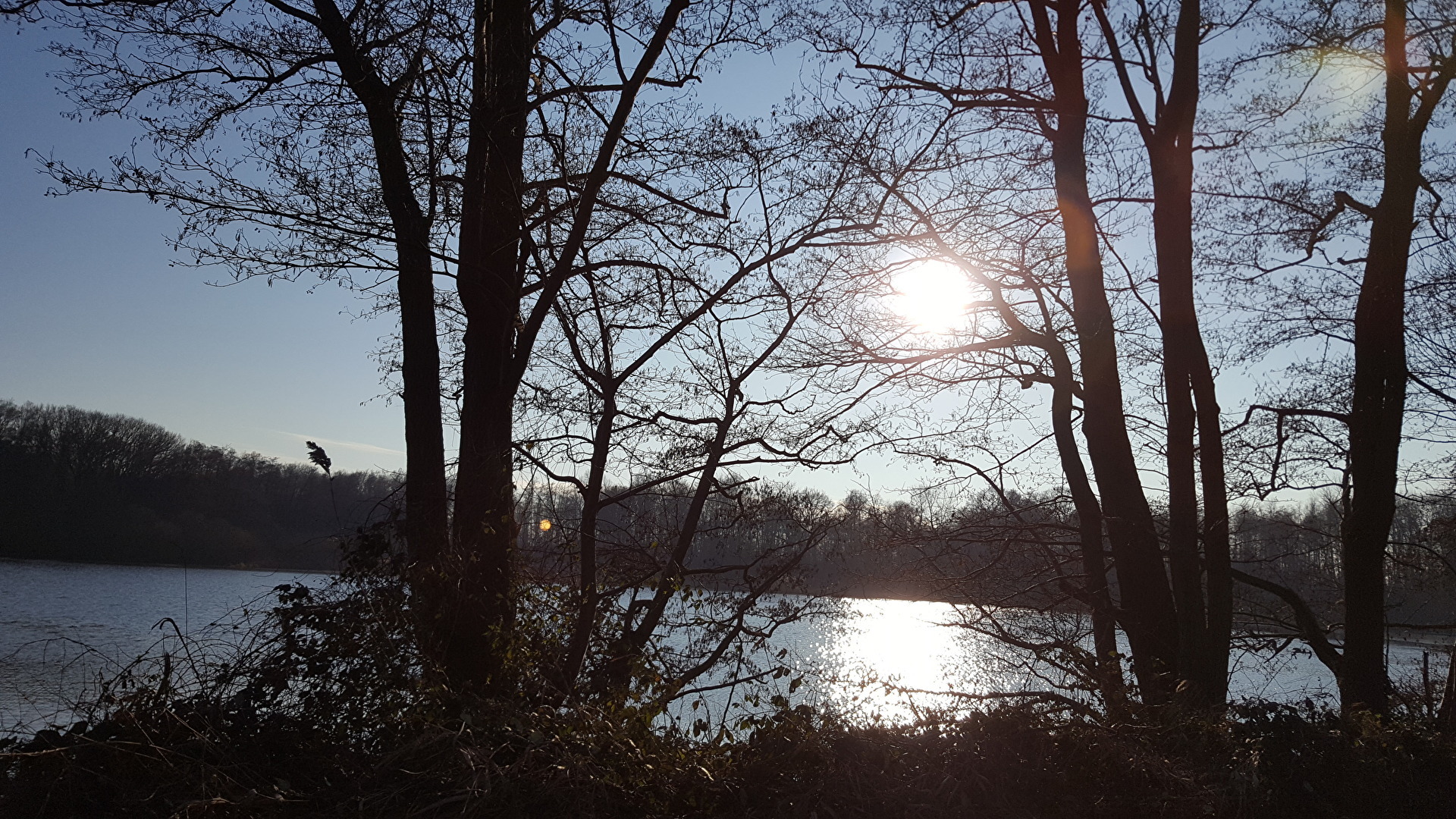 Sonne versinkt im See, De Wittsee- Bahntrasse