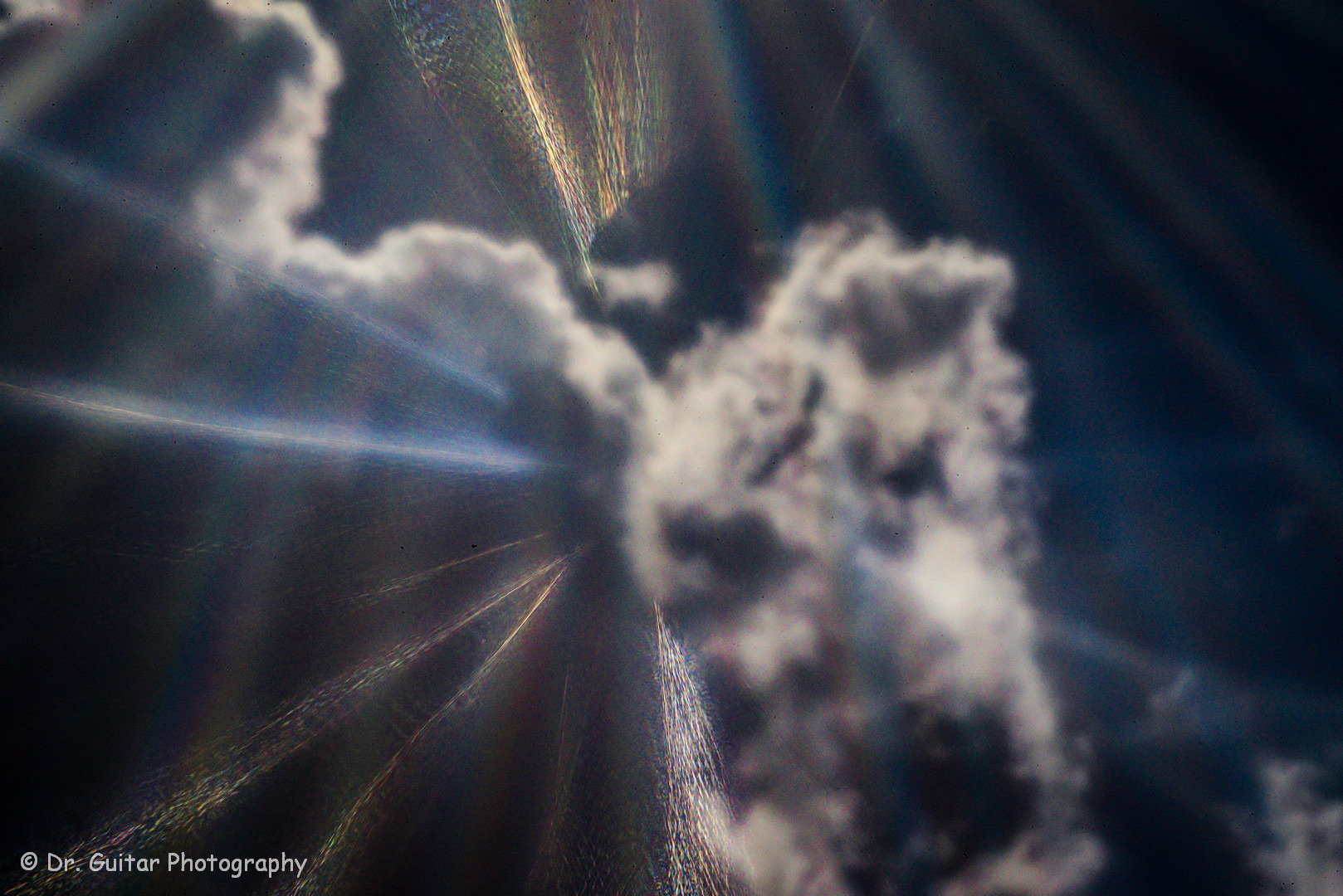 SUN BEHIND THE CLOUDS