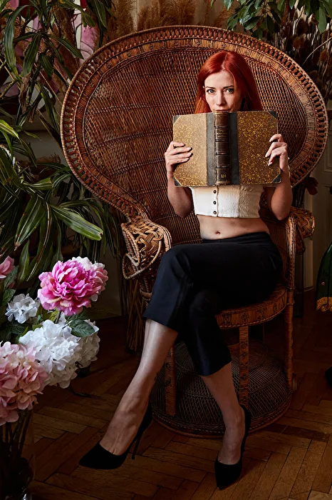 Anna in the rattan chair