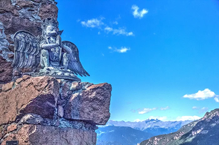 Mystical figure between sky and earth